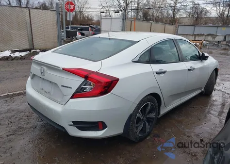 2017 Honda Civic Touring z USA, uszkodzony, nr VIN 19XFC1F9XHE032339
